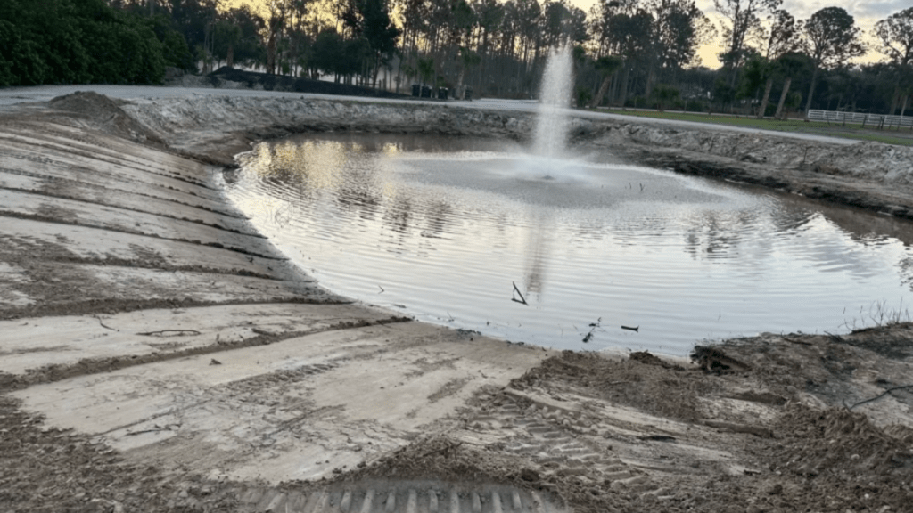 Land prepared for a pond and fountain