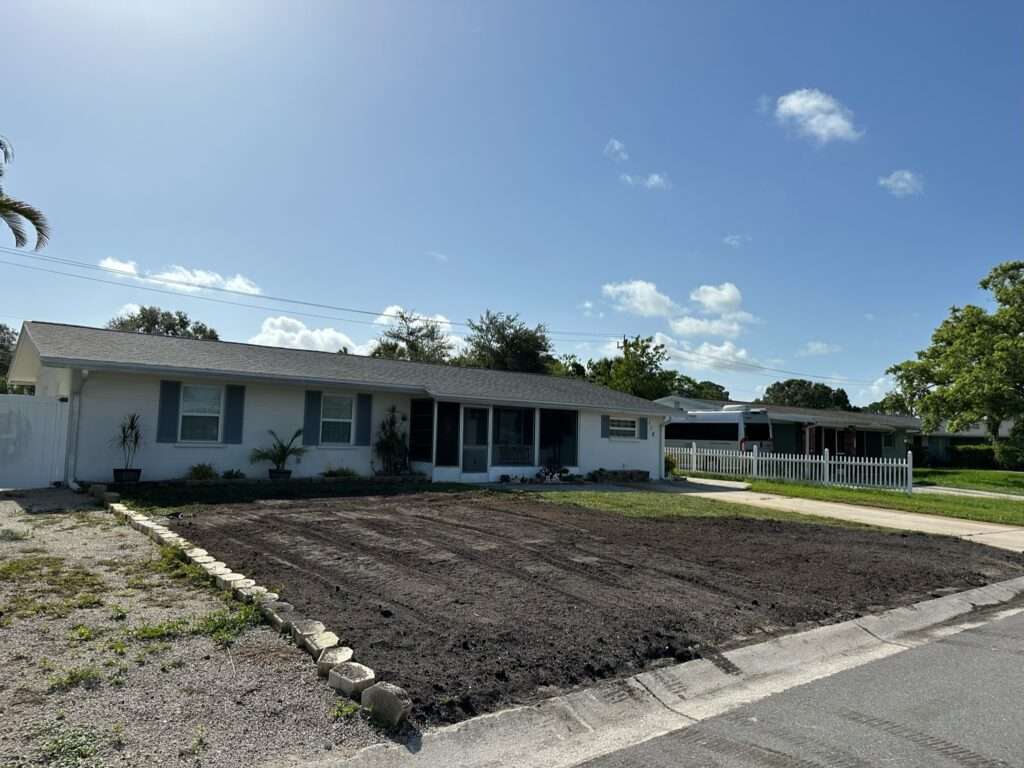 Front lawn being resloped and graded